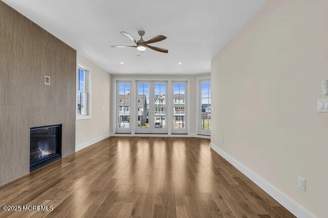 11 Union Avenue Spring Lake, NJ 07762 - Photo 53 of 109 a view of an empty room with a window and wooden floor