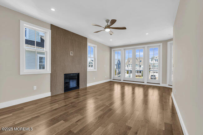 11 Union Avenue Spring Lake, NJ 07762 - Photo 54 of 109 a view of an empty room with wooden floor and a window
