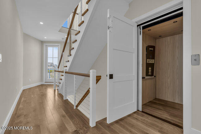 11 Union Avenue Spring Lake, NJ 07762 - Photo 61 of 109 a view of entryway with wooden floor and stairs