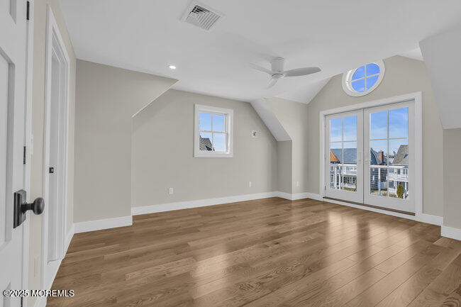 11 Union Avenue Spring Lake, NJ 07762 - Photo 69 of 109 an empty room with wooden floor and windows