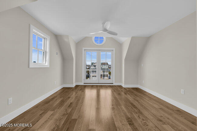 11 Union Avenue Spring Lake, NJ 07762 - Photo 70 of 109 a view of an empty room with wooden floor and a window
