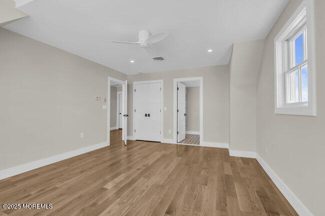 11 Union Avenue Spring Lake, NJ 07762 - Photo 71 of 109 a view of an empty room with wooden floor