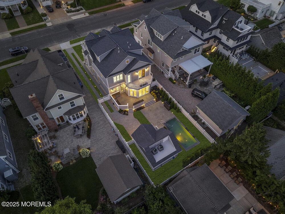 11 Union Avenue Spring Lake, NJ 07762 - Photo 100 of 109 an aerial view of a residential apartment building with a yard