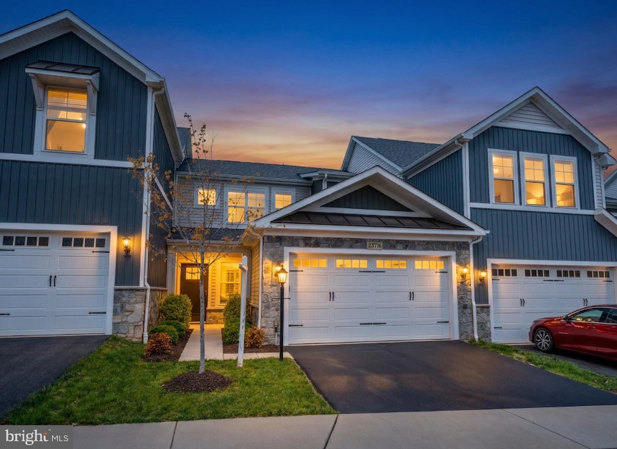 23716 September Sun Square Ashburn, VA 20148 - Photo 1 of 48 a front view of a house with garden
