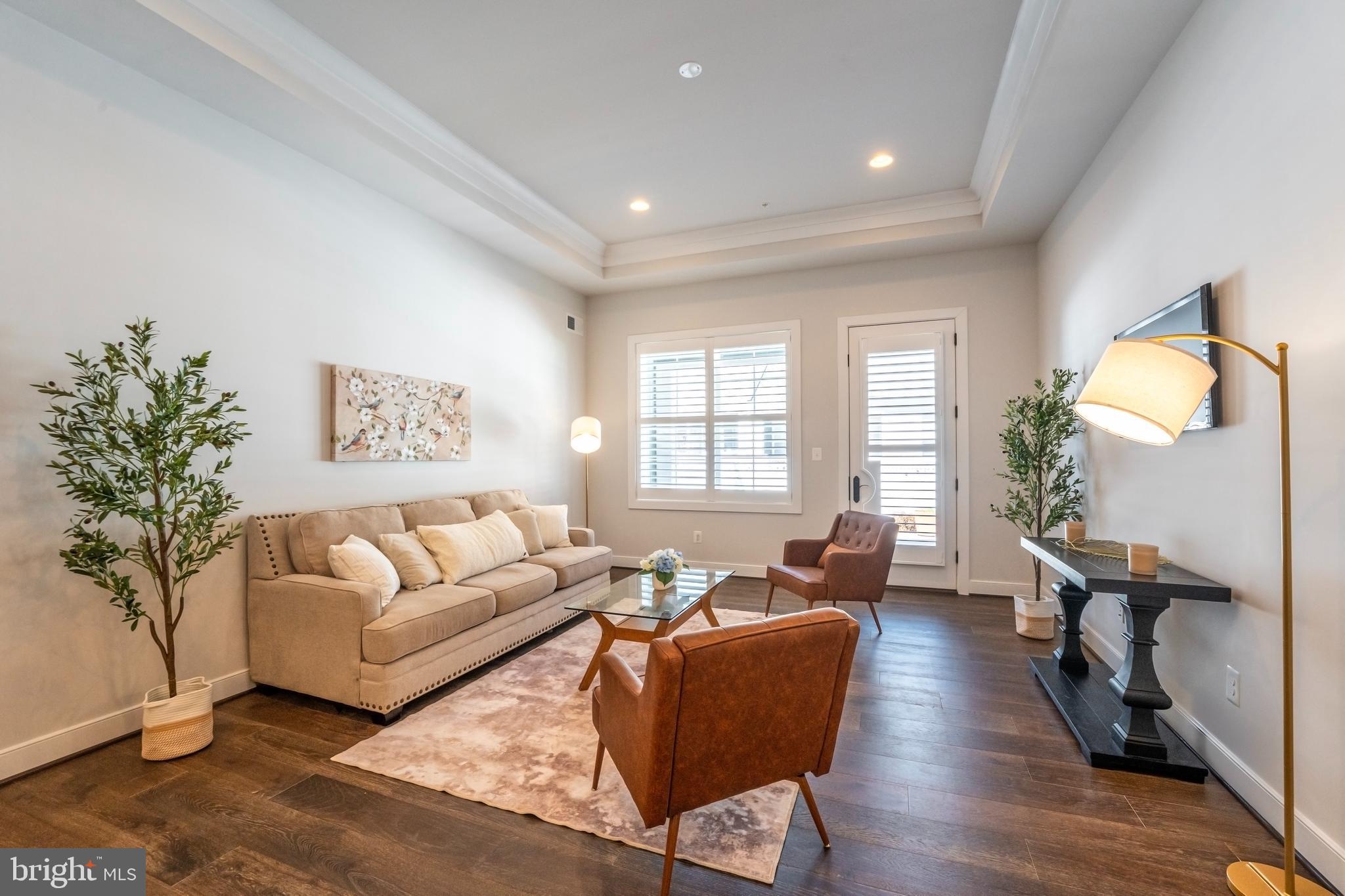 23716 September Sun Square Ashburn, VA 20148 - Photo 14 of 48 a living room with furniture and a large window