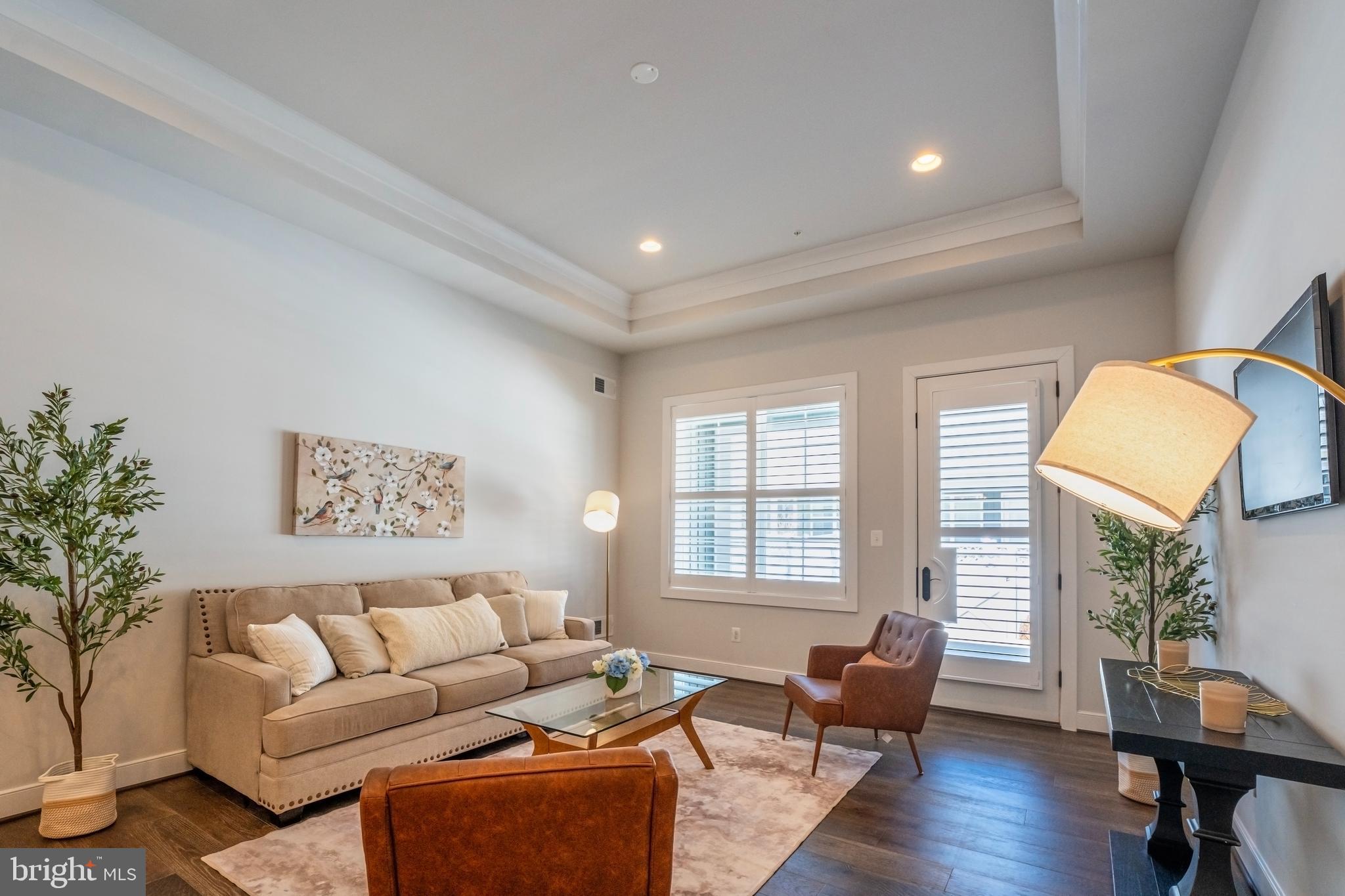 23716 September Sun Square Ashburn, VA 20148 - Photo 16 of 48 a living room with furniture and a window
