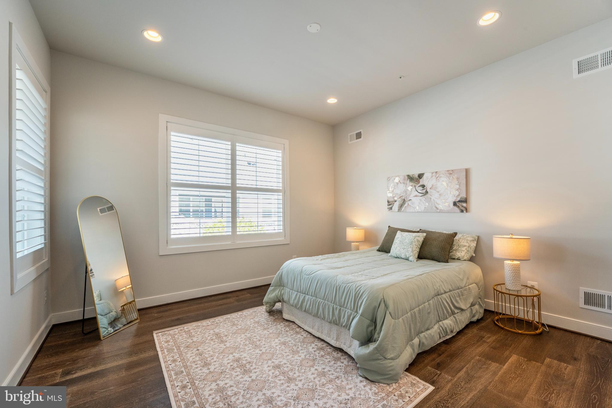 23716 September Sun Square Ashburn, VA 20148 - Photo 17 of 48 a bedroom with a large bed and a window