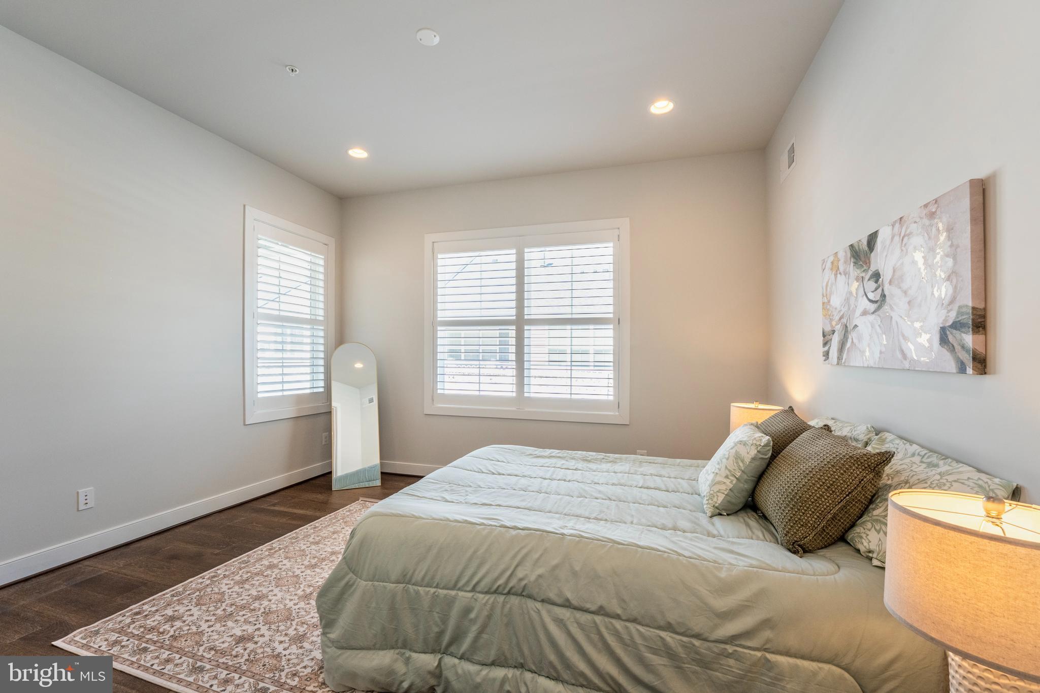 23716 September Sun Square Ashburn, VA 20148 - Photo 18 of 48 a bedroom with a large bed and a window