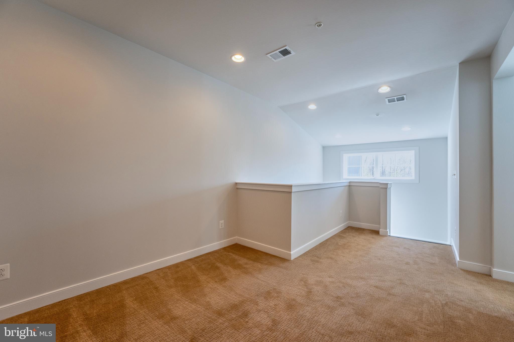 23716 September Sun Square Ashburn, VA 20148 - Photo 26 of 48 an empty room with a empty space and windows