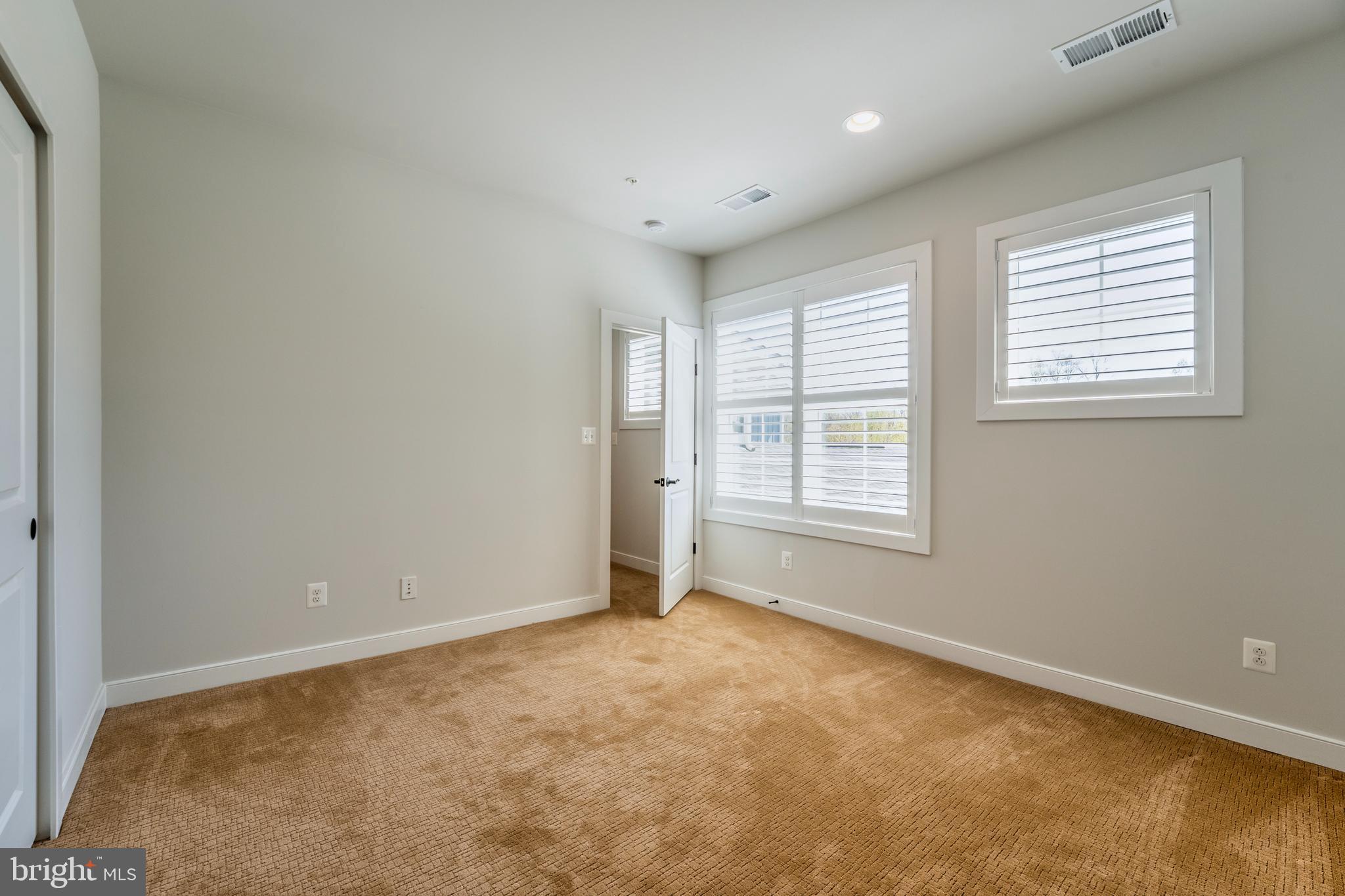 23716 September Sun Square Ashburn, VA 20148 - Photo 32 of 48 a view of an empty room with a window
