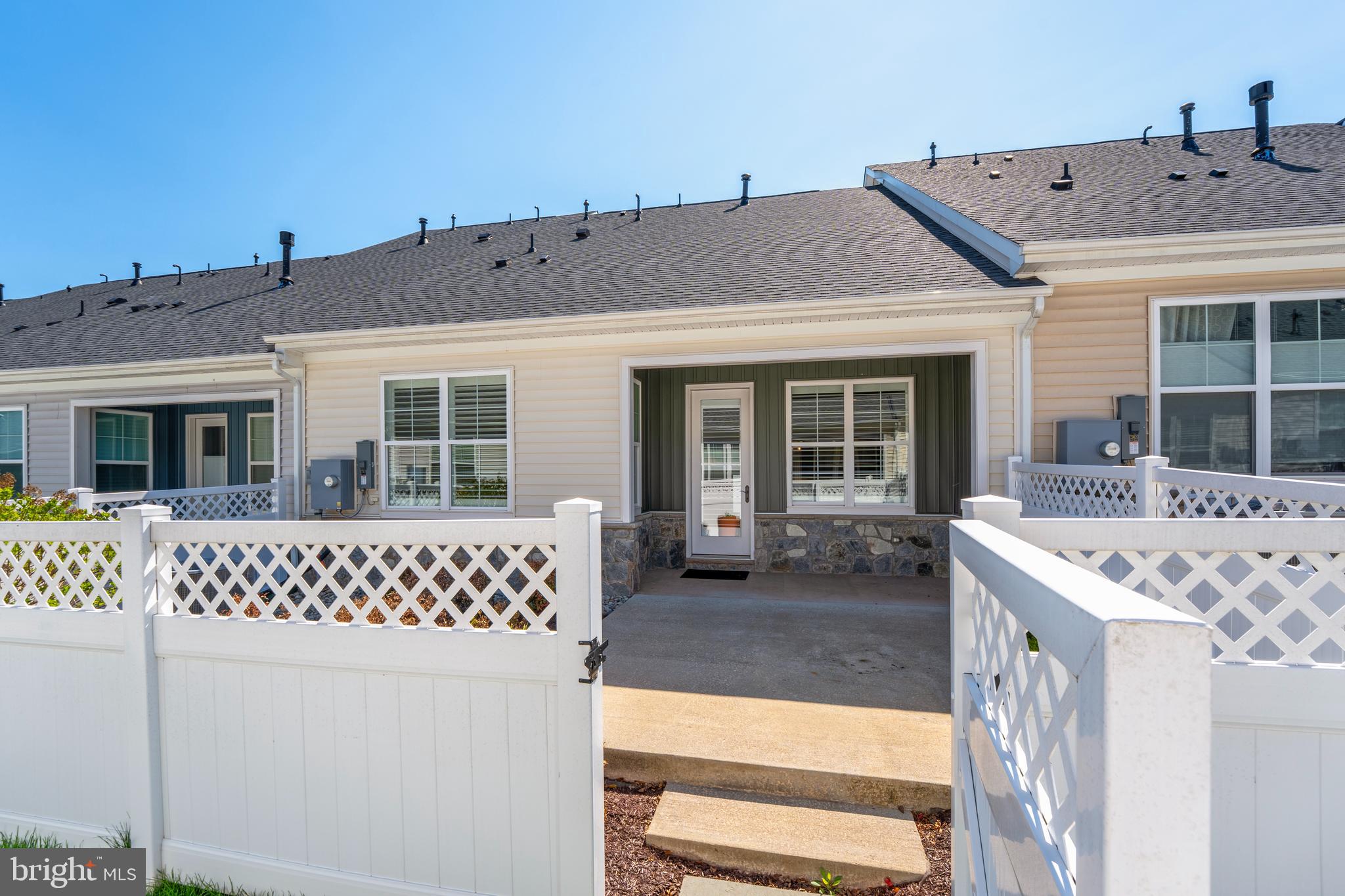 23716 September Sun Square Ashburn, VA 20148 - Photo 36 of 48 a front view of a house with a yard