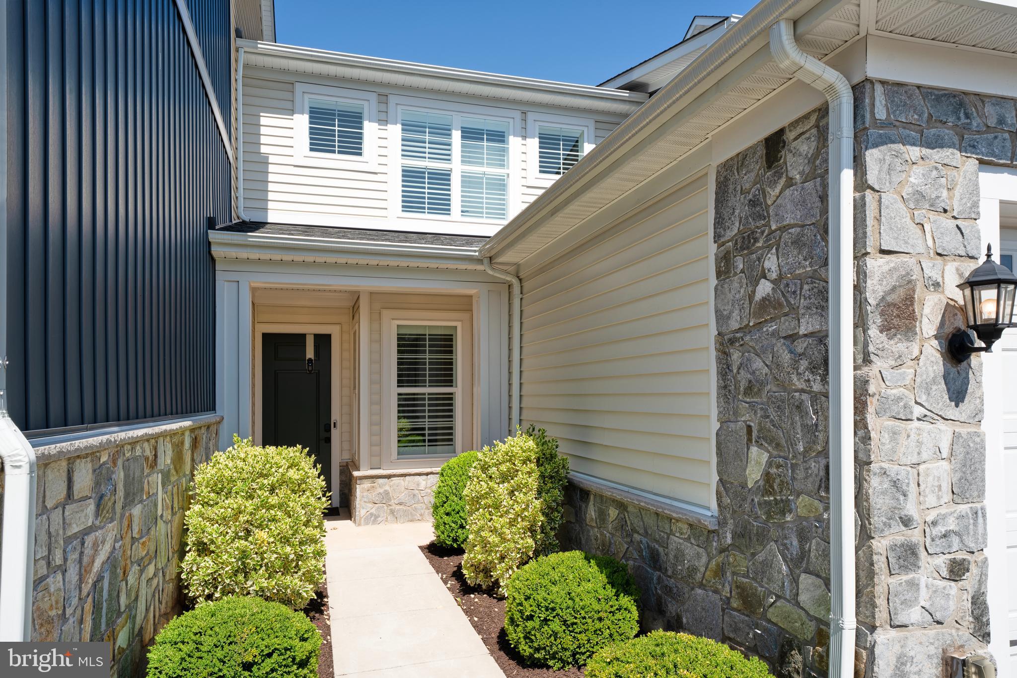 23716 September Sun Square Ashburn, VA 20148 - Photo 4 of 48 a view of a pathway of house