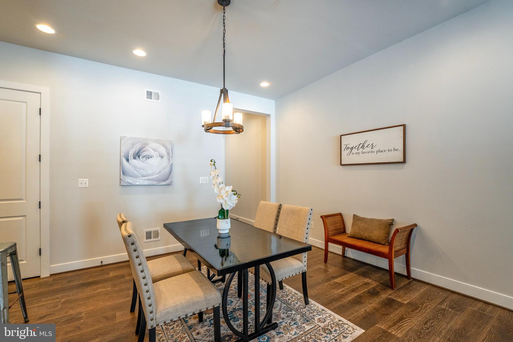 23716 September Sun Square Ashburn, VA 20148 - Photo 8 of 48 a view of a dining room with furniture
