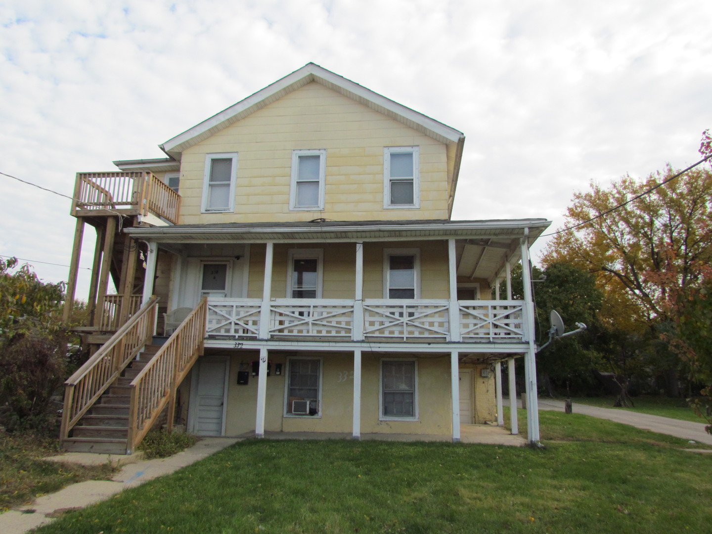 332 South Broadway Aurora, IL 60505 - Photo 6 of 9 a view of house with a yard