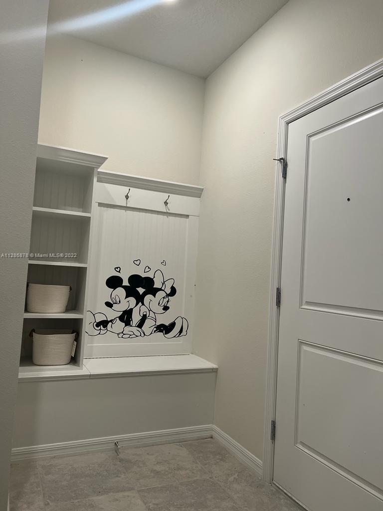 7108 Oakmoss Loop Davenport, FL 33837 - Photo 17 of 20 a bathroom with a sink