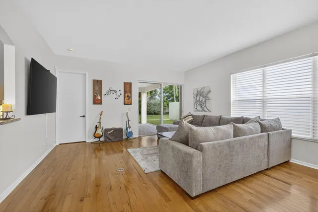 a living room with furniture and a table