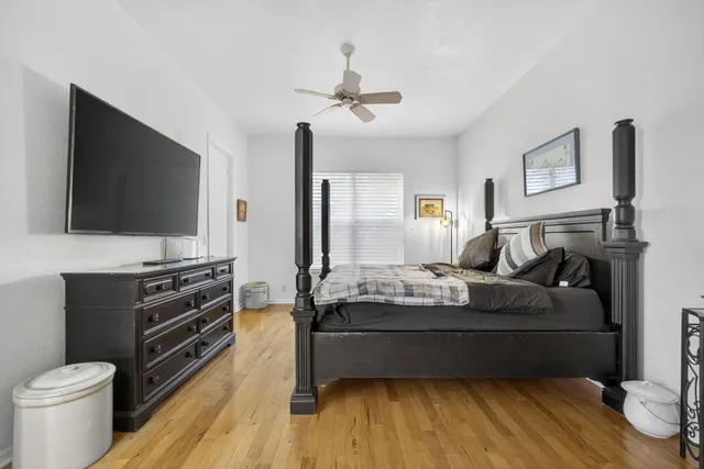 a bathroom with a shower and a glass door