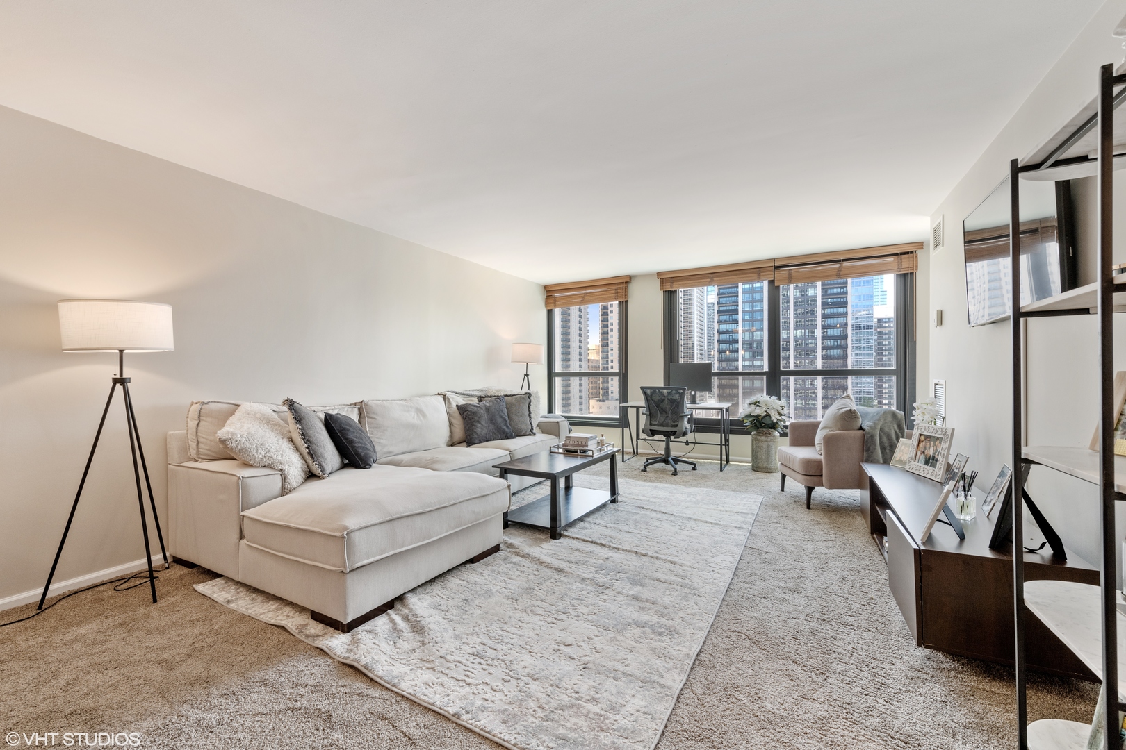 1030 North State Street, Unit 9K Chicago, IL 60610 - Photo 6 of 12 a living room with furniture and a large window