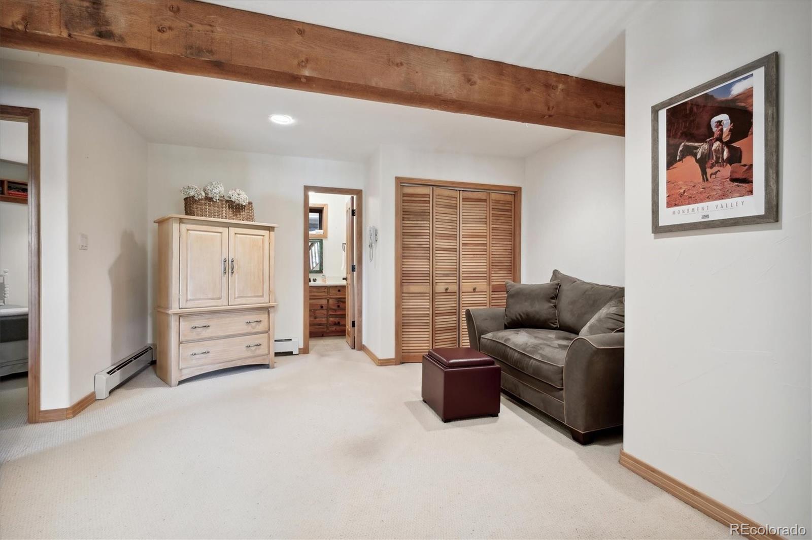 4671 Independence Trail Evergreen, CO 80439 - Photo 20 of 39 a view of livingroom with furniture and cabinet
