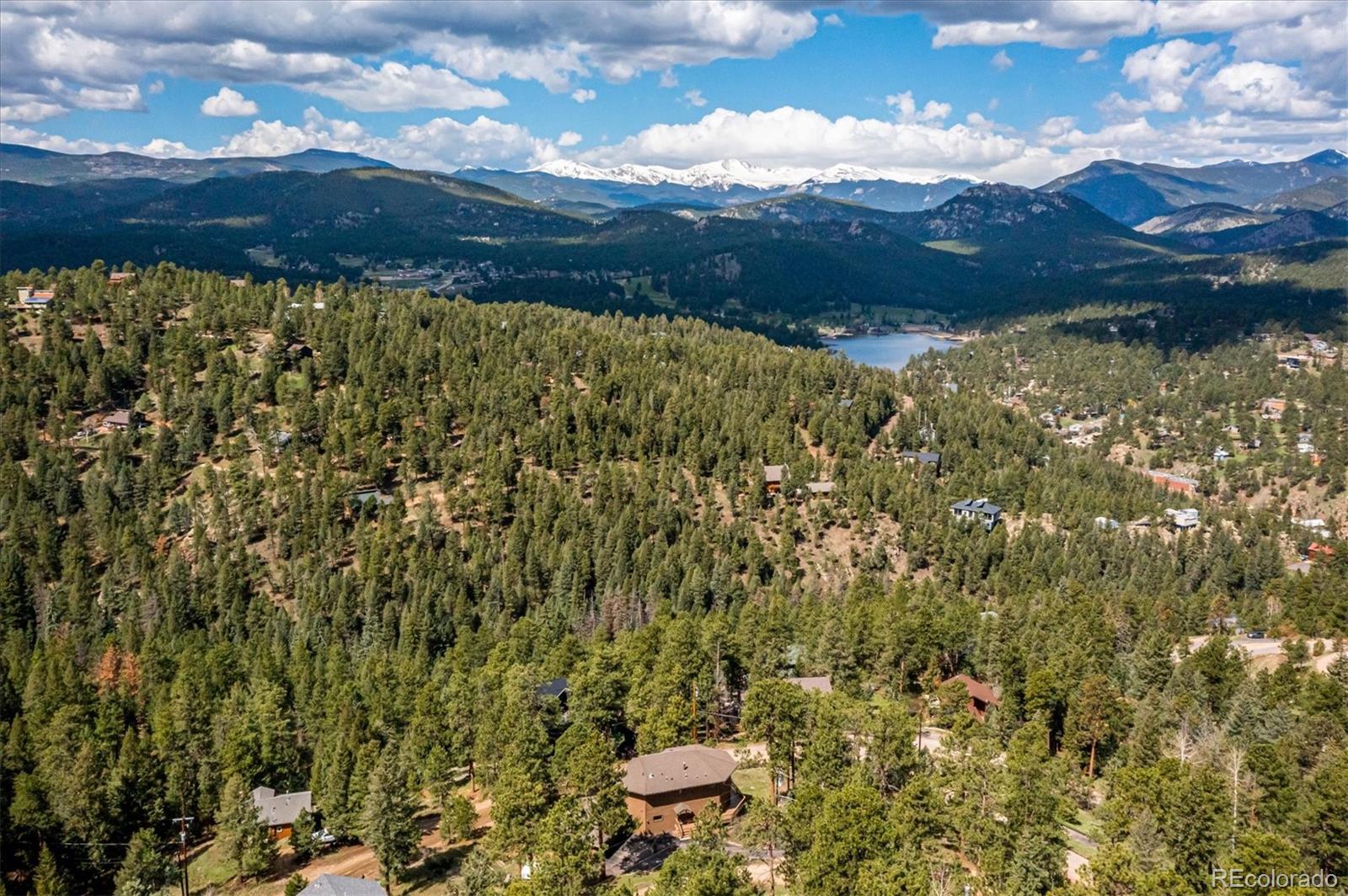 4671 Independence Trail Evergreen, CO 80439 - Photo 2 of 39 a view of a yard with a lake view