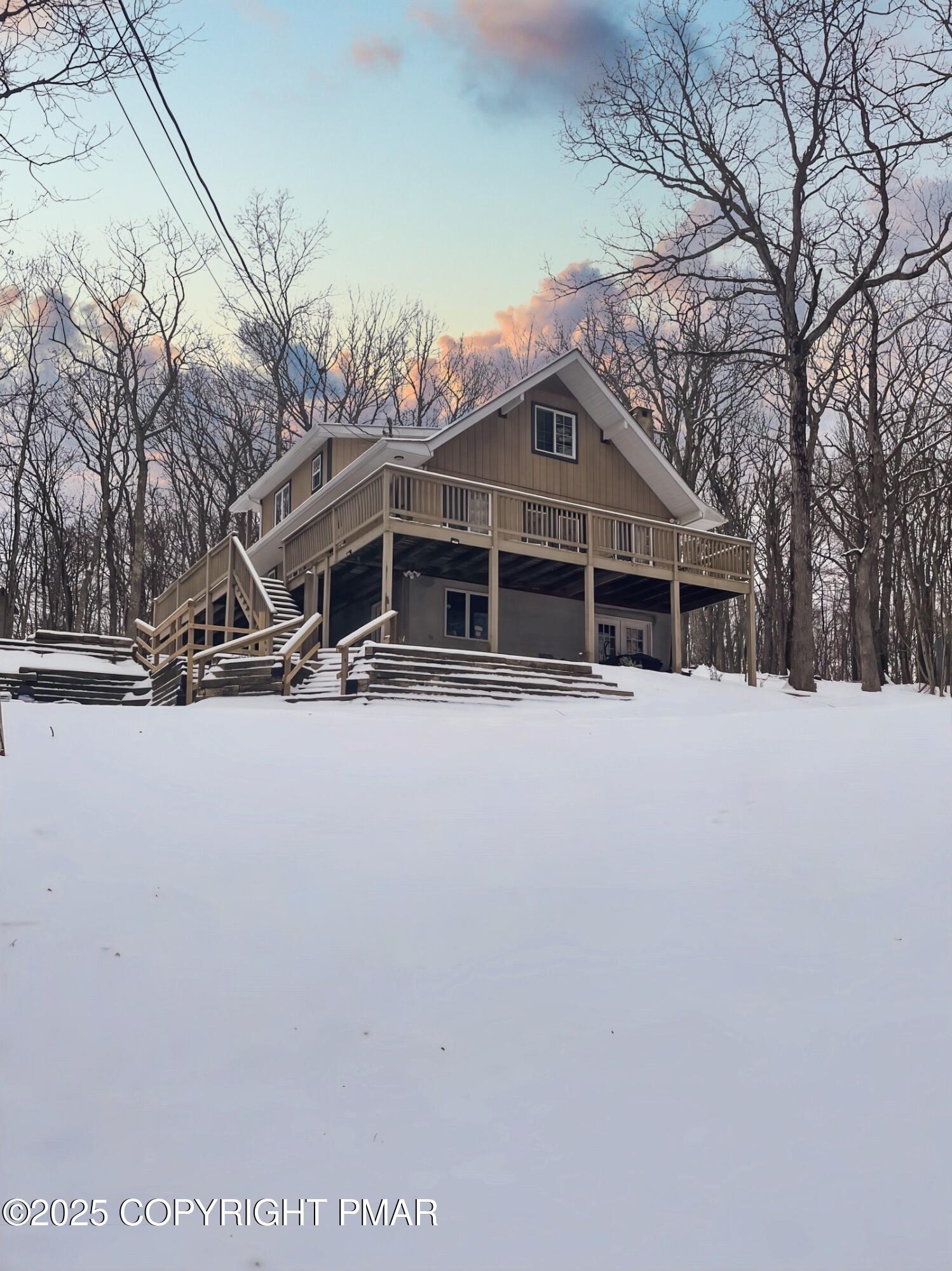 a view of house with a yard