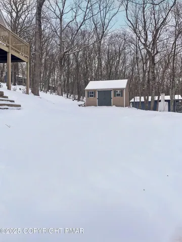 a view of snow on the road