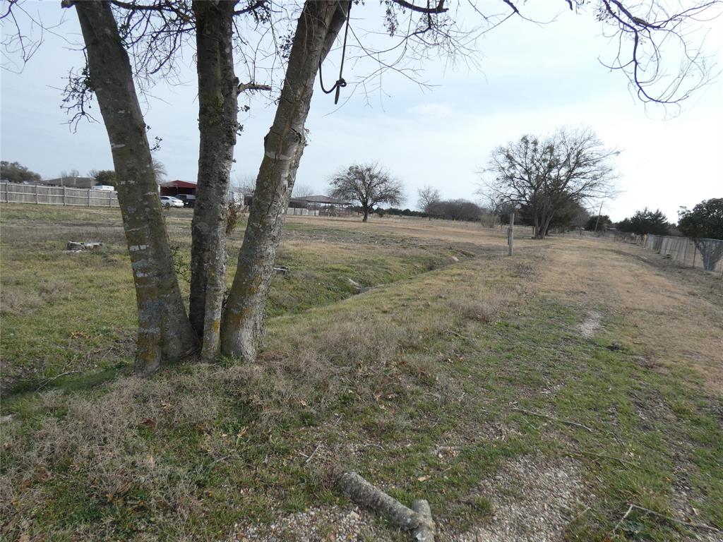 632 East Reindeer Road Lancaster, TX 75146 - Photo 16 of 24 a view of a backyard of the house