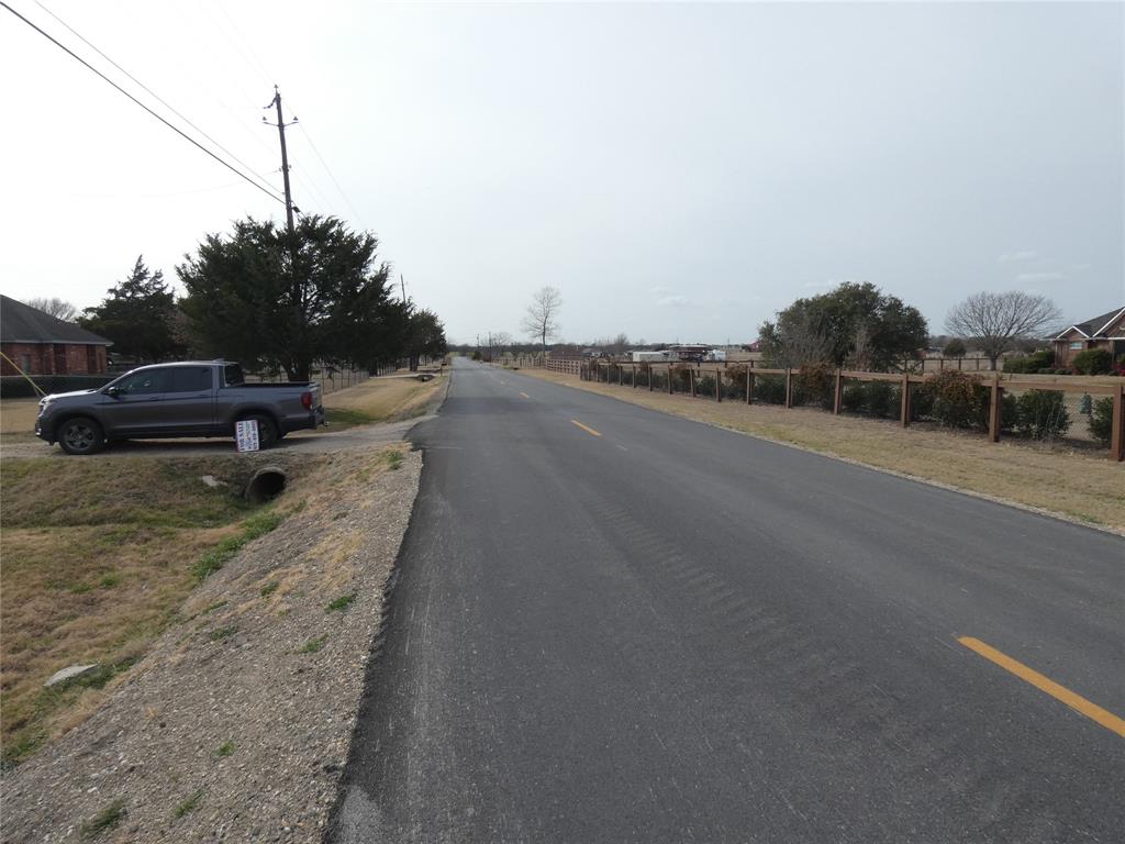 632 East Reindeer Road Lancaster, TX 75146 - Photo 21 of 24 a view of a road with a building in the background