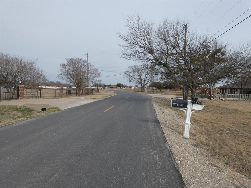 632 East Reindeer Road Lancaster, TX 75146 - Photo 7 of 24 a view of road with large trees