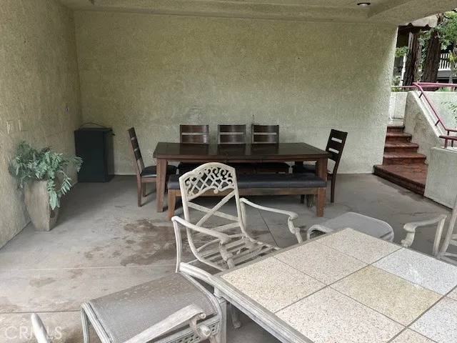 a bathroom with a toilet a sink and a window