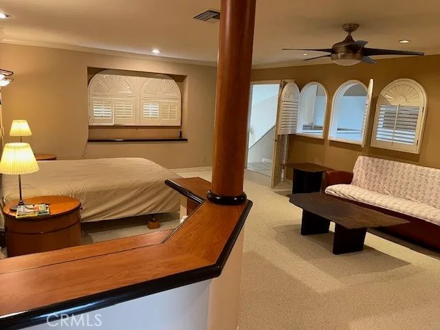 a bathroom with a toilet a sink and a shower