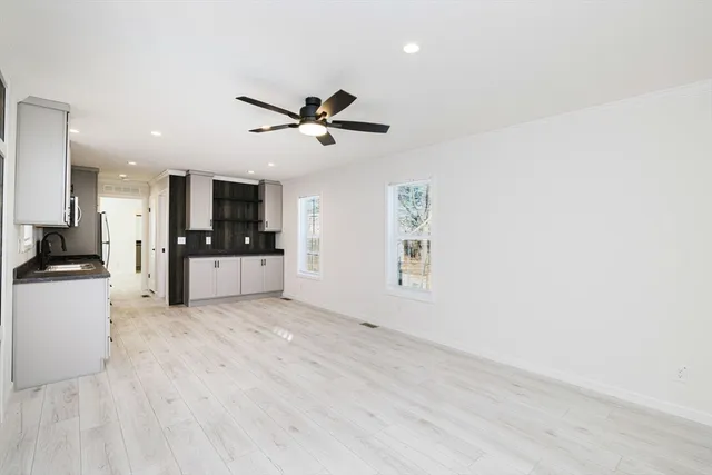 a bathroom with a bathtub and a toilet