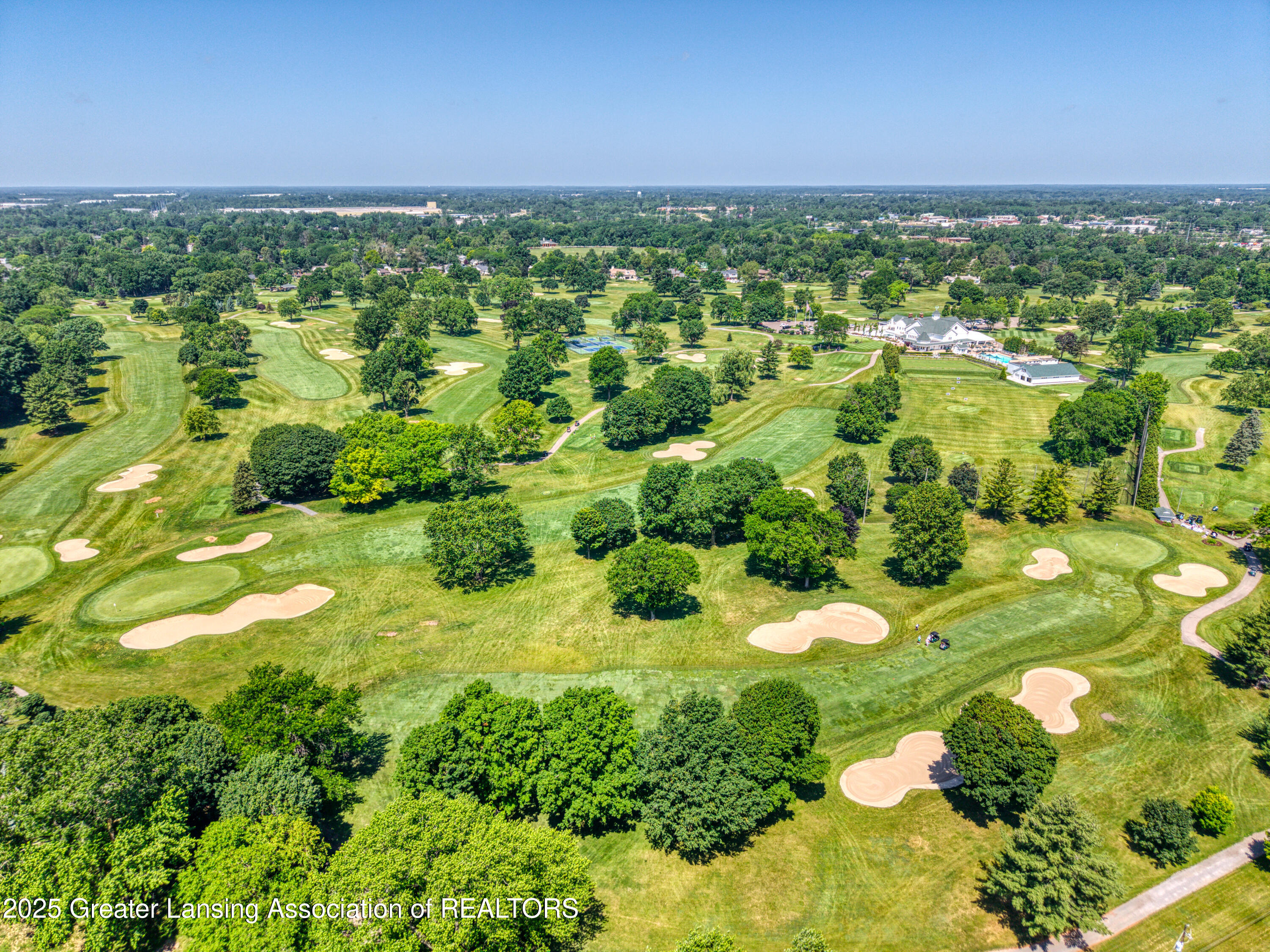 1740 Wellington Road, Unit 208 Lansing, MI 48910 - Photo 34 of 40 DJI_20250623120910_0272_D_4