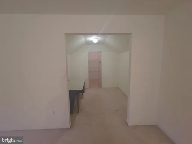 a bathroom with a sink a mirror and a toilet