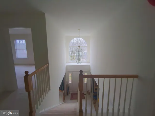 a view of a hallway with windows