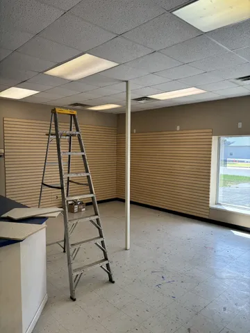 a view of a parking space and a car garage