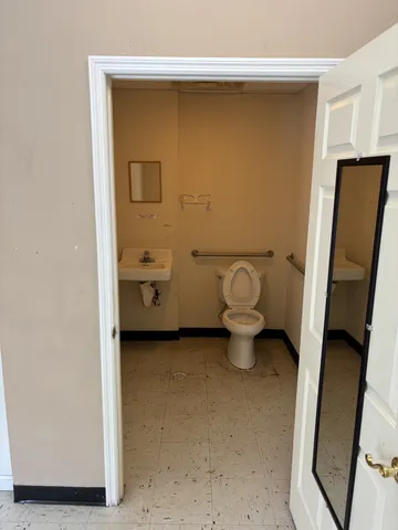a bathroom with a toilet