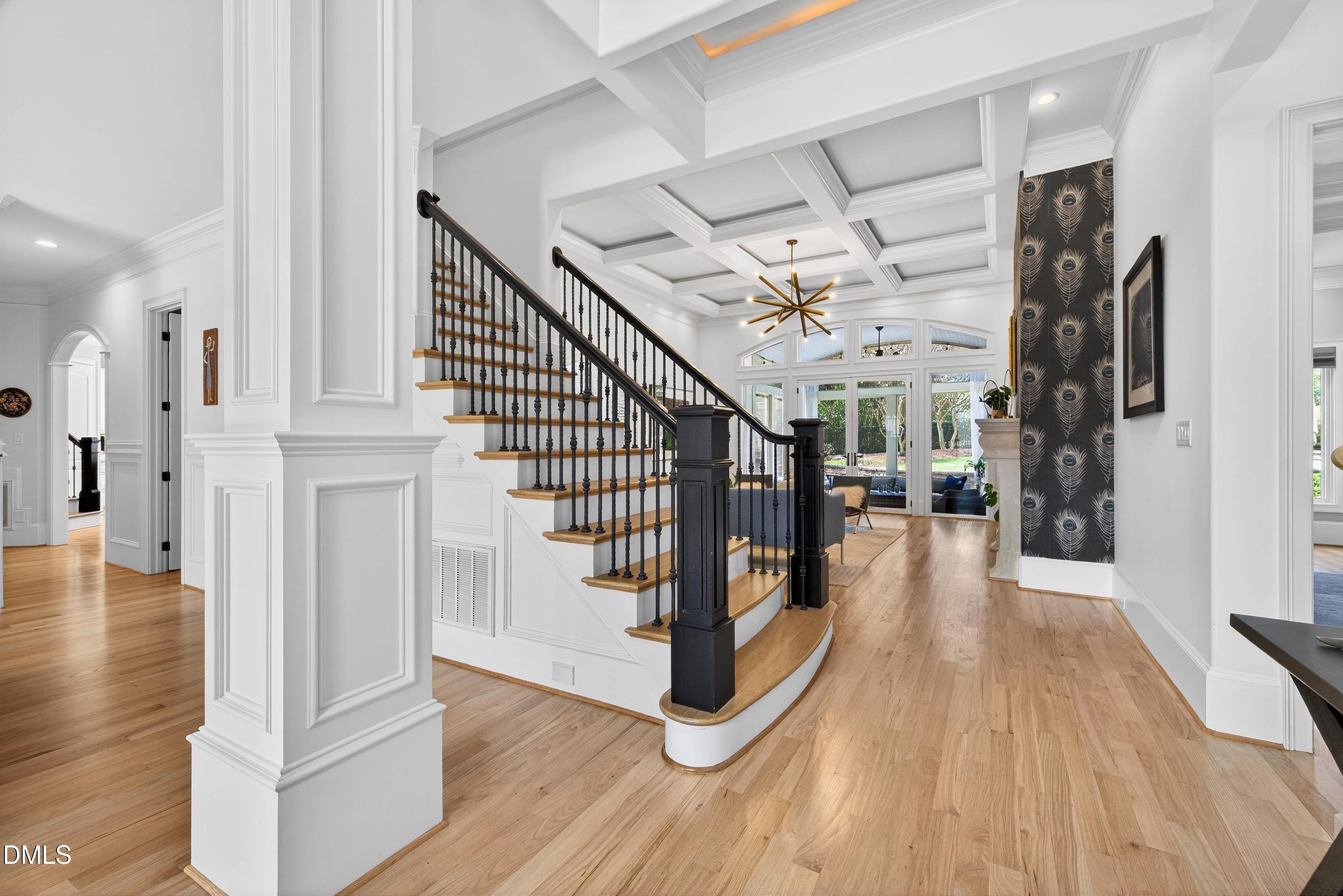 6701 Foxfire Place Raleigh, NC 27615 - Photo 4 of 67 a view of entryway and hall with wooden floor
