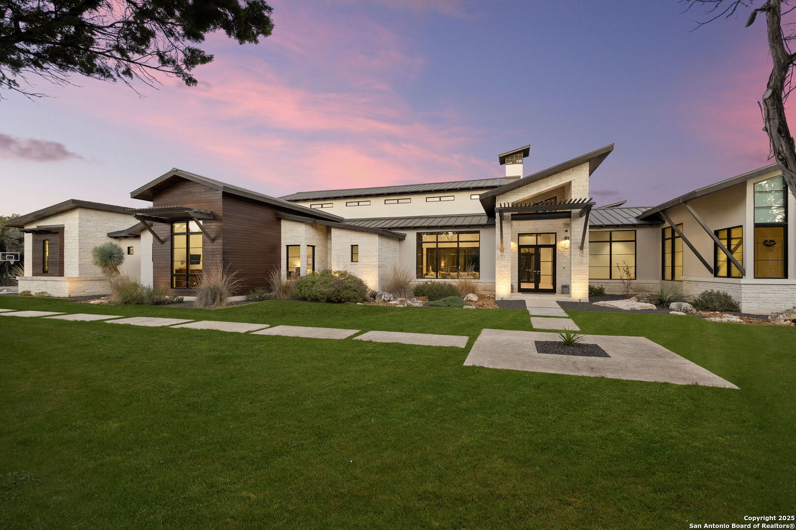 116 Sendero Ridge Boerne, TX 78006 - Photo 1 of 58 a front view of a house with a garden