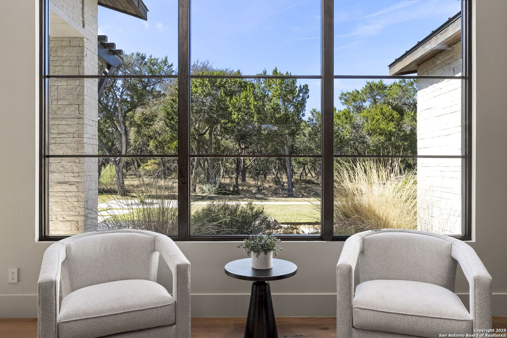 116 Sendero Ridge Boerne, TX 78006 - Photo 11 of 58 a living room with furniture and a large window