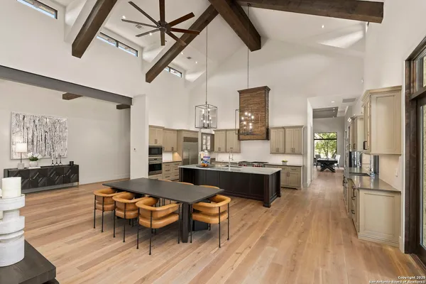 a kitchen with stainless steel appliances granite countertop a stove and refrigerator