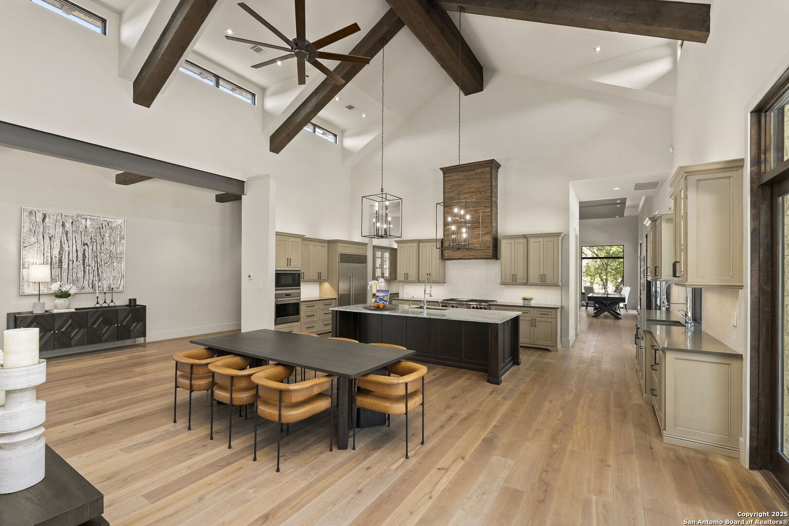 116 Sendero Ridge Boerne, TX 78006 - Photo 15 of 58 a large kitchen with a table and chairs