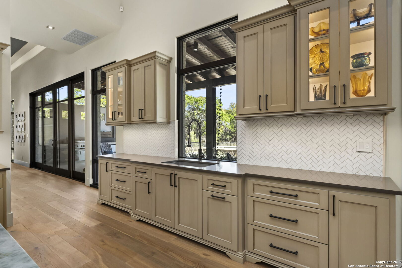 116 Sendero Ridge Boerne, TX 78006 - Photo 21 of 58 a kitchen with granite countertop a window and a sink