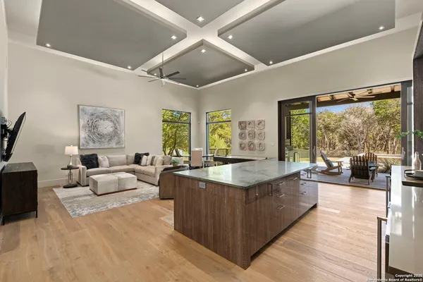 a view of a living room and dining room