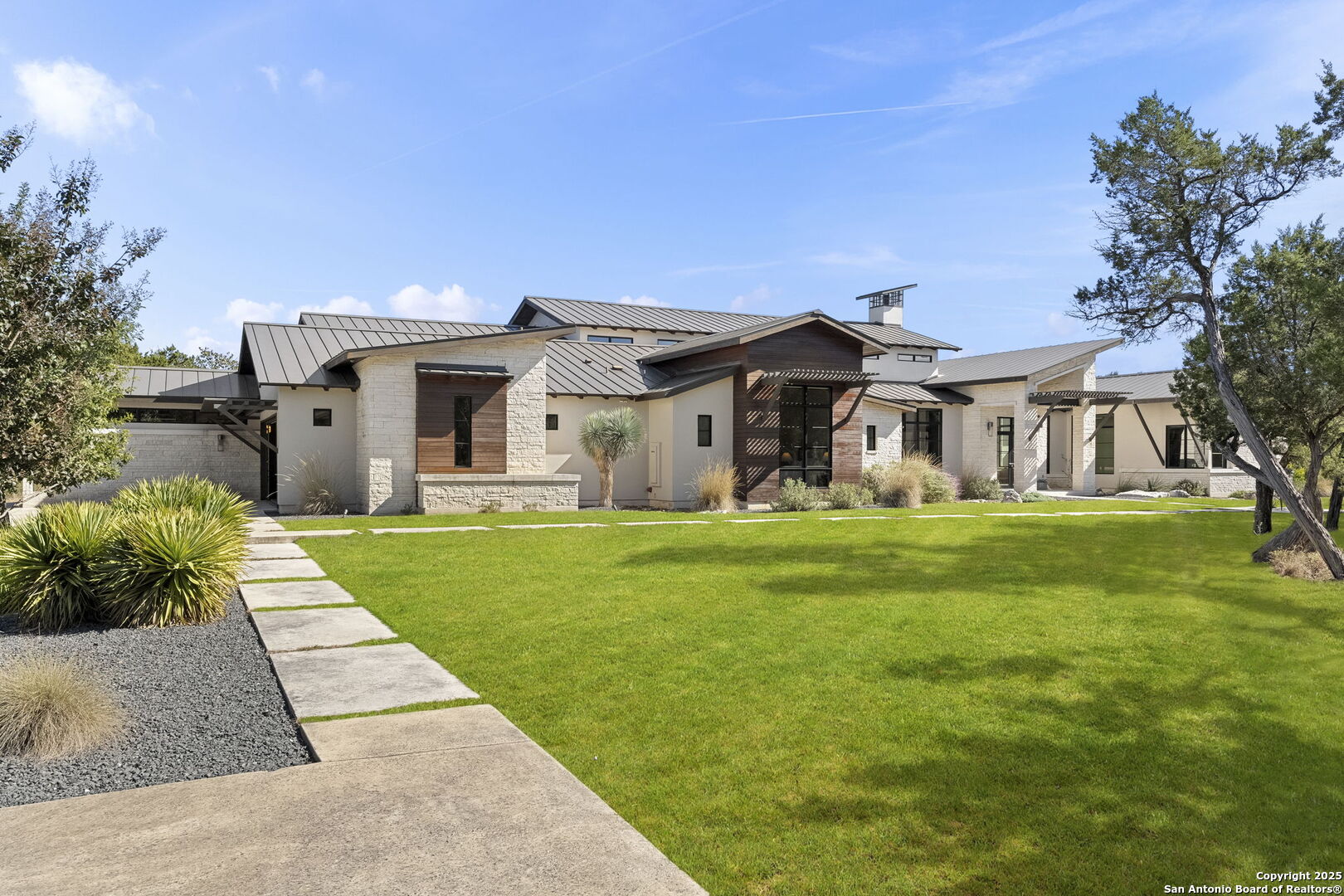 116 Sendero Ridge Boerne, TX 78006 - Photo 3 of 58 a front view of a house with garden