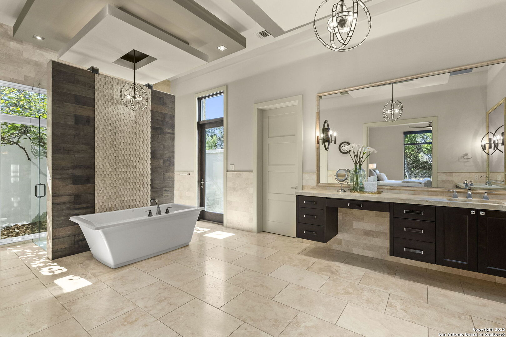 116 Sendero Ridge Boerne, TX 78006 - Photo 32 of 58 a spacious bathroom with a tub a double vanity sink a mirror and a shower