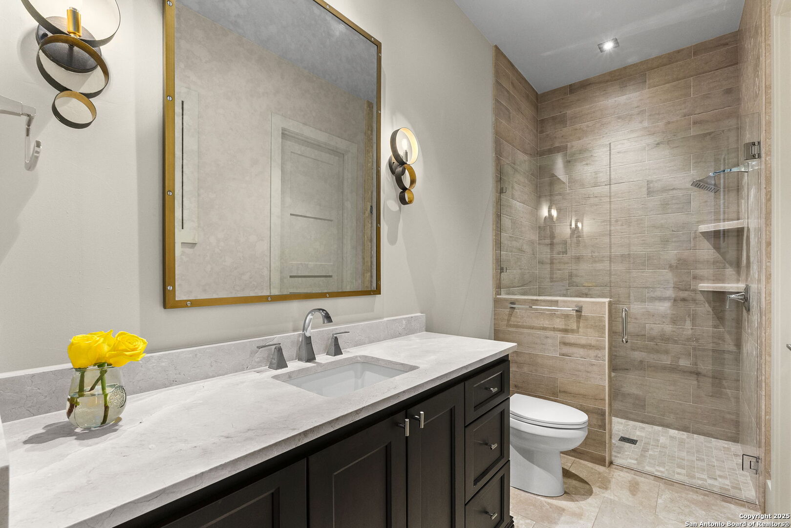 116 Sendero Ridge Boerne, TX 78006 - Photo 40 of 58 a bathroom with a sink a toilet and shower