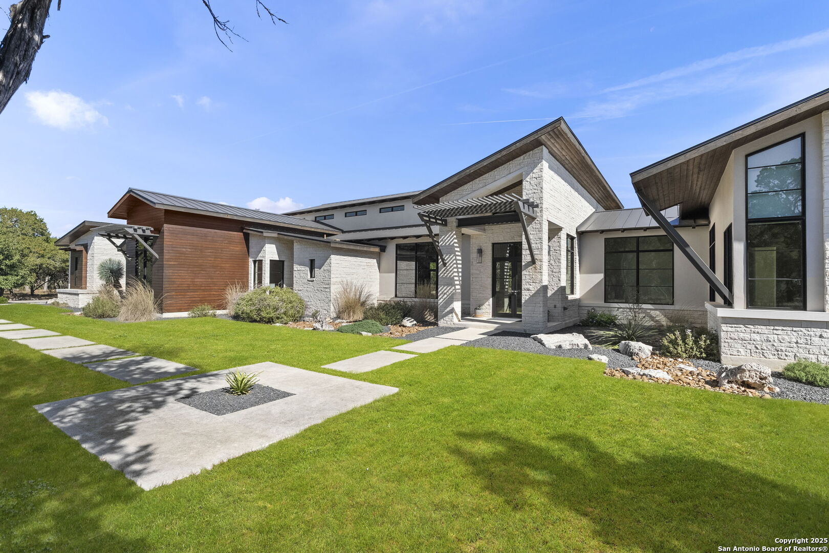 116 Sendero Ridge Boerne, TX 78006 - Photo 4 of 58 a front view of a house with yard and green space