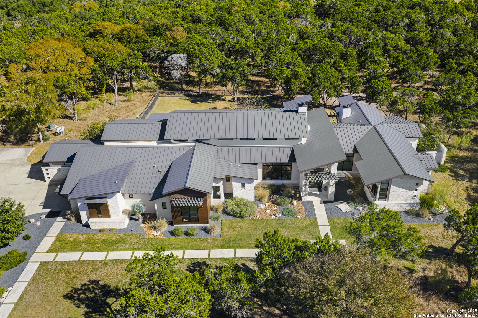 116 Sendero Ridge Boerne, TX 78006 - Photo 5 of 58 an aerial view of a house with a garden