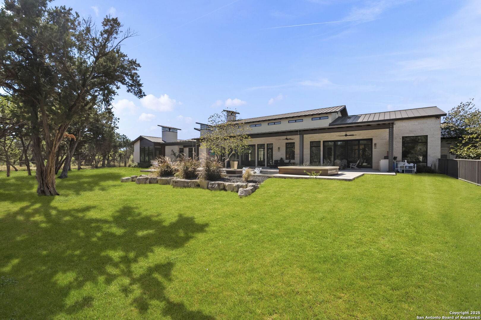 116 Sendero Ridge Boerne, TX 78006 - Photo 54 of 58 a swimming pool view with a seating space and a garden view